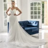 Angélique wedding dress featuring an elegant silhouette and delicate detailing, creating a romantic and sophisticated look for the modern bride.