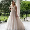 Aphroditie wedding dress featuring a graceful silhouette and elegant detailing, creating a sophisticated and romantic bridal style for the modern bride.