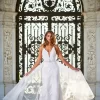 Celine wedding gown showcasing a sophisticated fitted silhouette with elegant detailing, creating a timeless and graceful bridal look.
