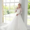 Bridal model wearing the Felicity wedding gown, featuring a graceful silhouette and delicate detailing for an elegant bridal look.