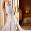 Claudia wedding dress featuring a graceful silhouette and intricate detailing, designed to create a refined and elegant bridal look