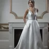 Darcy wedding dress featuring a flattering silhouette with elegant detailing, offering a timeless and sophisticated style for the modern bride.