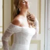 Bridal model showcasing the Dream wedding dress with an elegant flowing skirt and refined detailing, photographed for CB Bridal Studio.