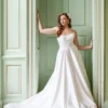 Bridal model showcasing the Cassidy wedding dress with a fitted silhouette and elegant detailing, photographed for CB Bridal Studio.