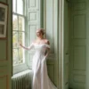 Elara wedding dress showcasing a graceful silhouette with refined detailing, offering a sophisticated and elegant style for a timeless bridal look.